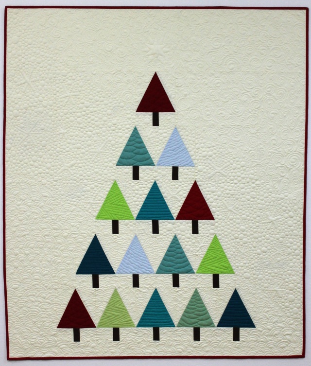 “Modern Trees” is a Free Modern Christmas Quilt Pattern designed by Christa from Christa Quilts